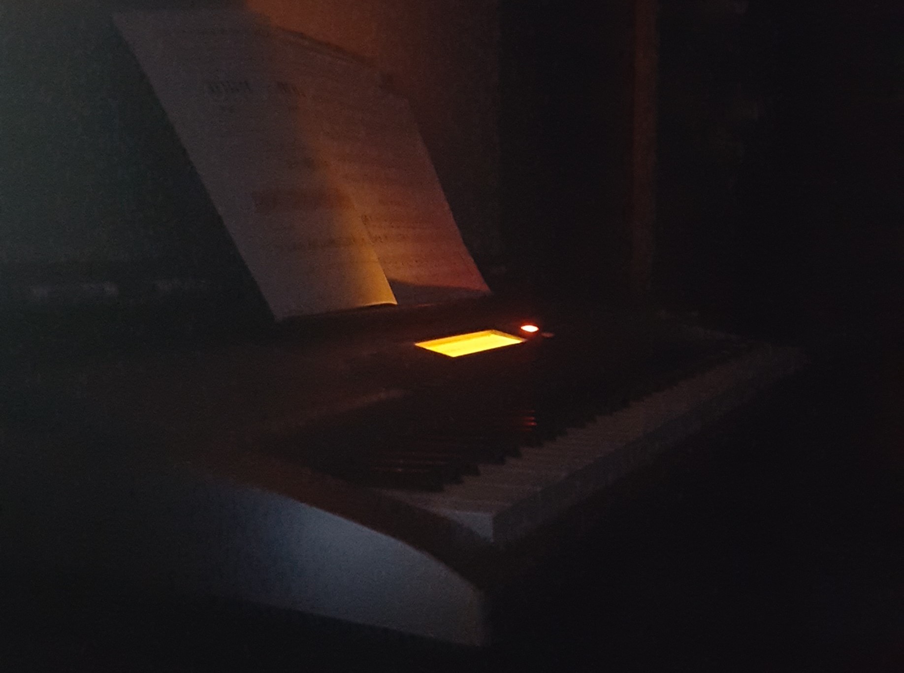 Electronic Piano shot in the dark